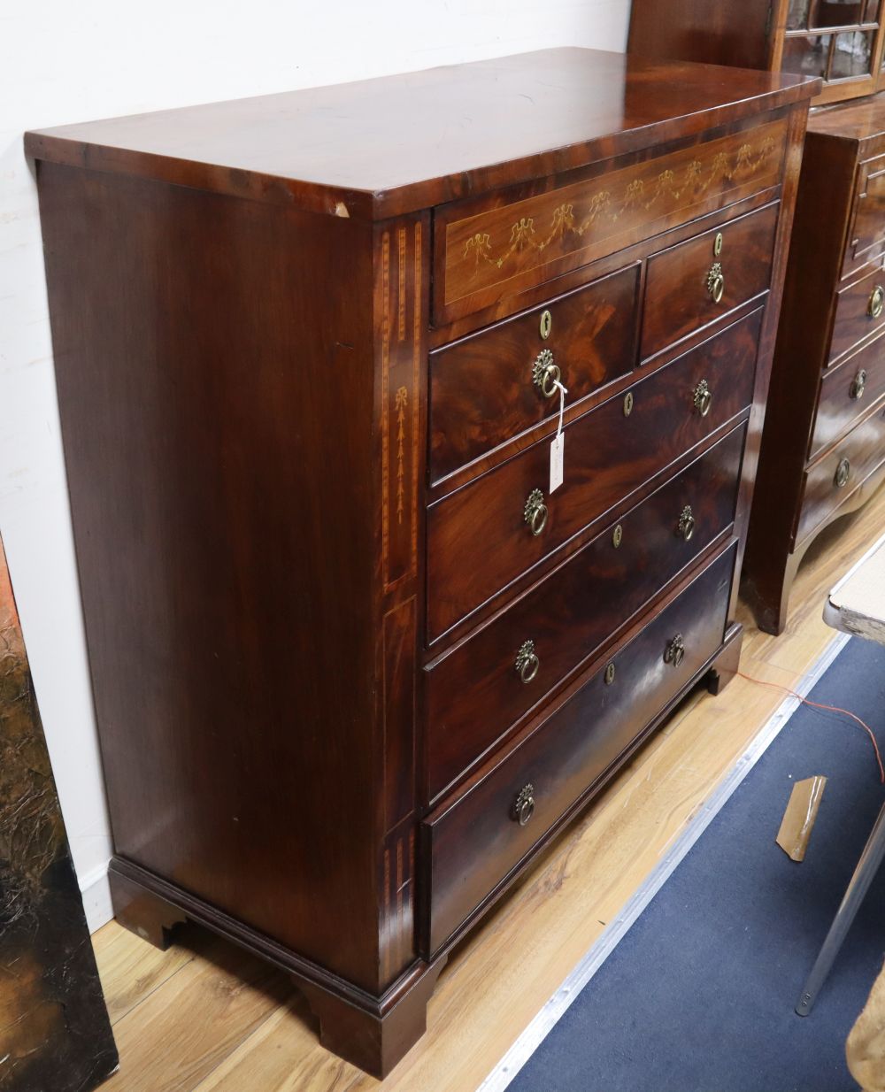 A large 19th century inlaid mahogany chest, W.116cm, D.48cm, H.113cm